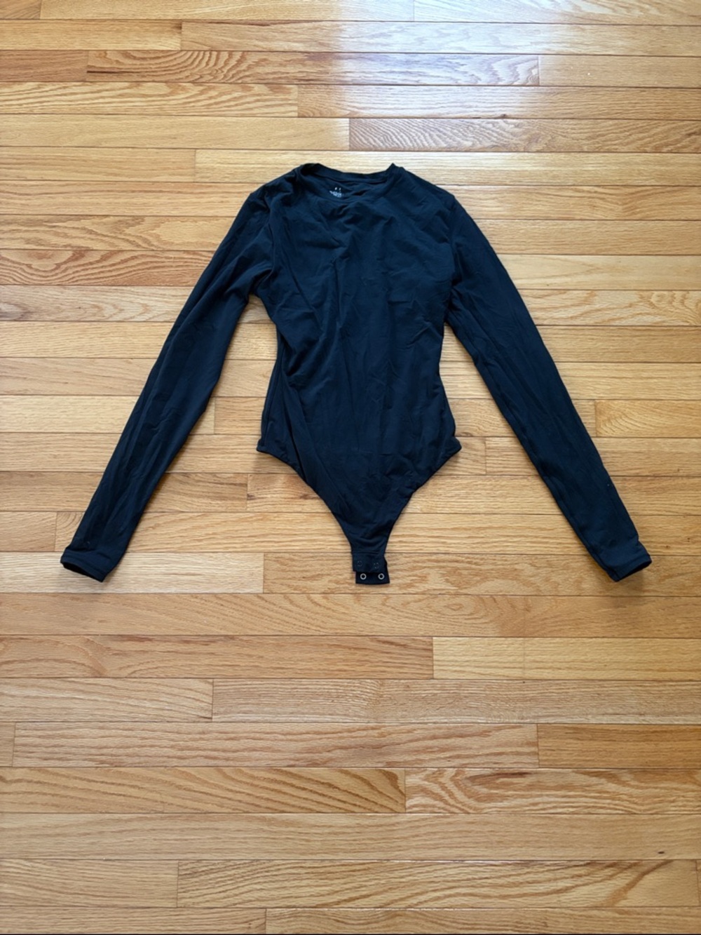 SKIMS Black Long Sleeve Bodysuit with Snap Closure